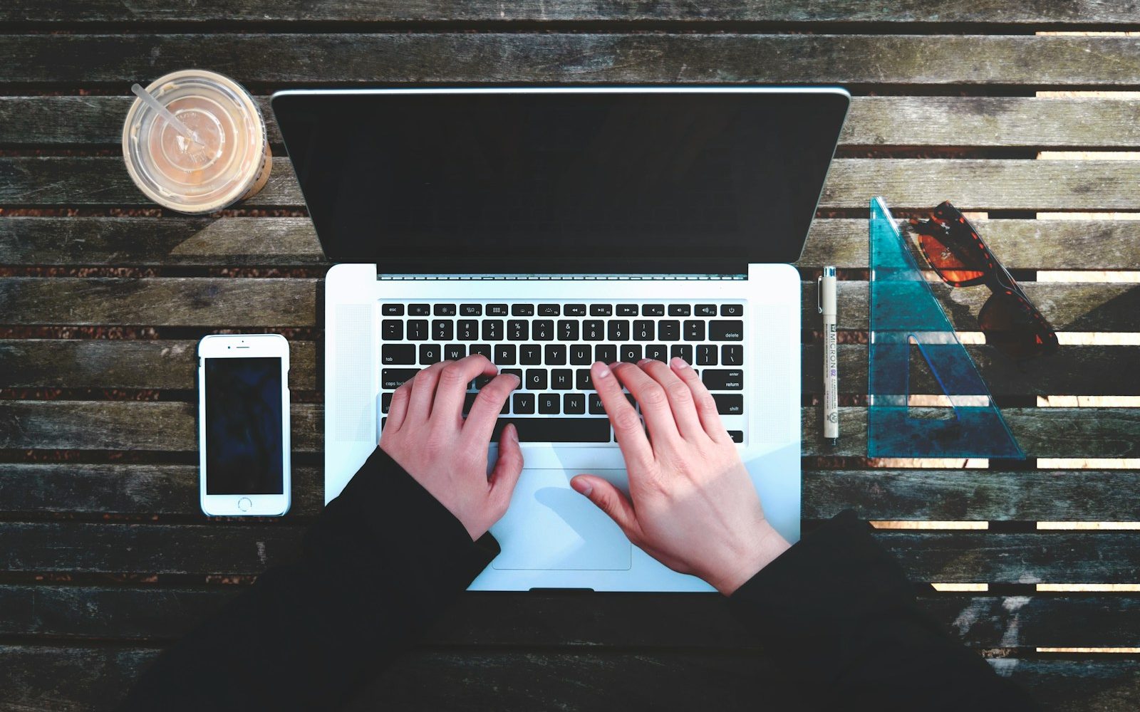 flat-lay photography of person about to use laptop computer